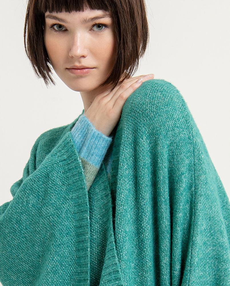 Chaqueta poncho punto de arroz Surkana Waya 834 turquesa detalle