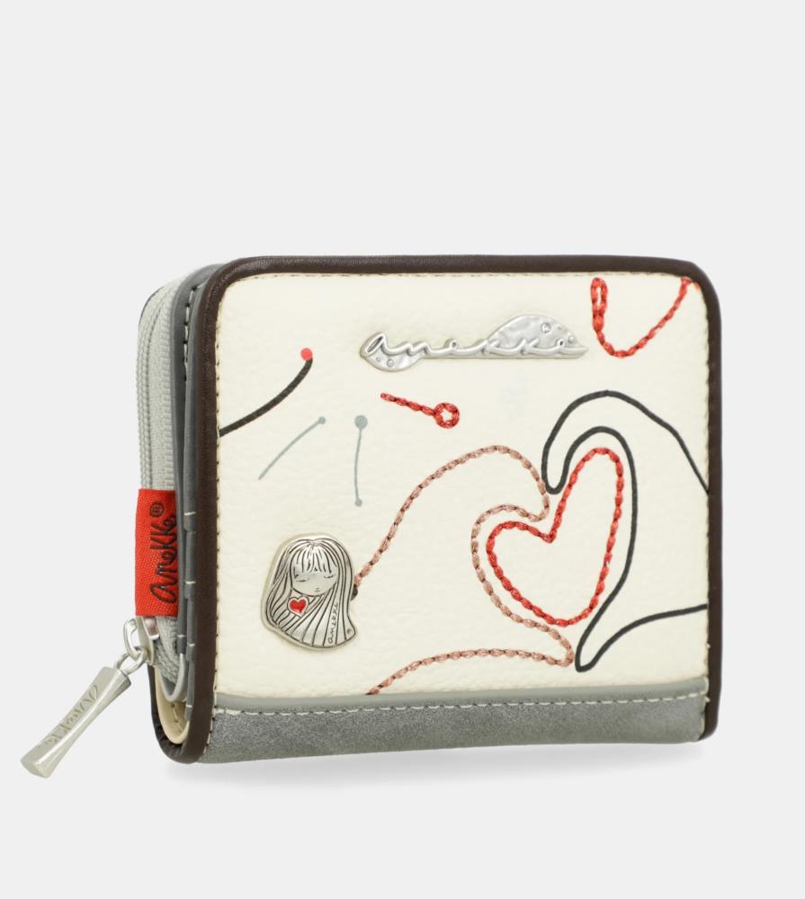 Billetera pequeña con cremallera manos corazón Anekke Alma cerca