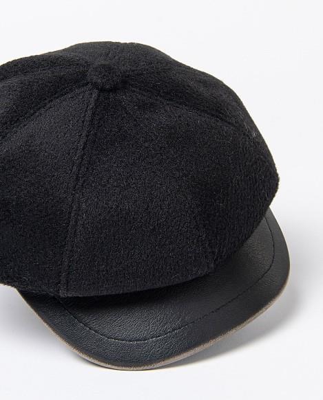 Visera con botones Surkana Gopa negra detalle material