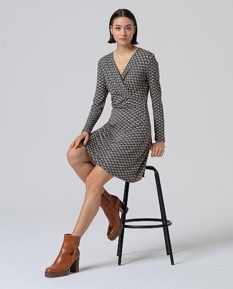 Vestido cuello pico cruzado estampado mini orquideas Surkana Omfo ladeada